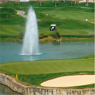 Fountain in a pond on a golf course